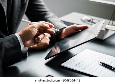 Close up of businessman or lawyers discussing about contract or  business agreement at law firm office, business people making deal document legal, law and justice advice service concept. - Shutterstock ID 2049364442