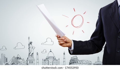 Close up of businessman with papers in hands
