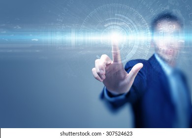 Close Up Of Businessman Touching Virtual Panel With Finger