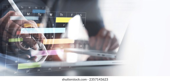 Close up of businessman using digital tablet with calendar planner and organizer to plan and reminder daily appointment, meeting agenda, schedule, timetable, and management, event planning - Powered by Shutterstock