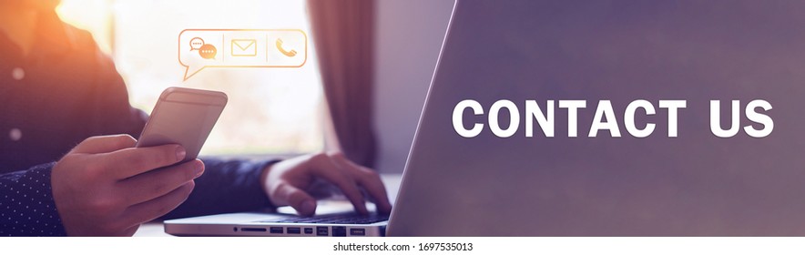 Close Up Businessman Using Laptop Holding Mobile Smart Phone, Using Device To Contact People Or Contacting Information On Business, Concept Of Contact Us Messaging Calling Email, With Graphic Icon 