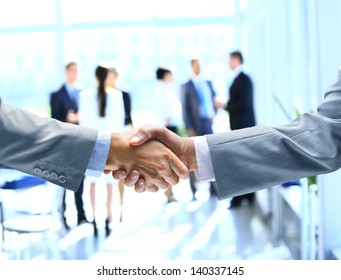 Close Up Of Businessmen Shaking Hands