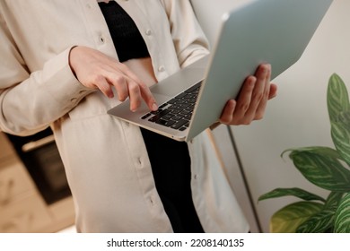 Close Up Of Businesswoman Freelancer Working  Laptop At Home Office On Kitchen