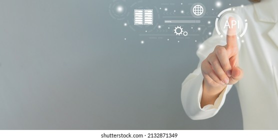 close up businesswoman hand touch on API software programming to synchronize and transfer data from database to website for technology business concept	 - Shutterstock ID 2132871349