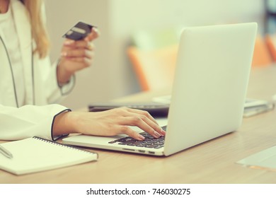 Close Up Businesswoman Hand Using Laptop And Make Payment By Credit Card , Shopping Online Concept