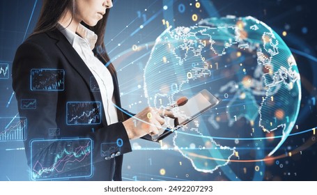 Close up of businesswoman hands using tablet with creative binary coding globe on blurry background. World map and global business technologies concept. Double exposure