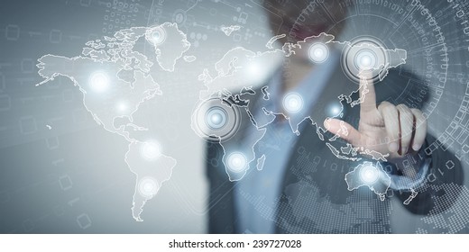 Close up of businesswoman touching media screen with finger