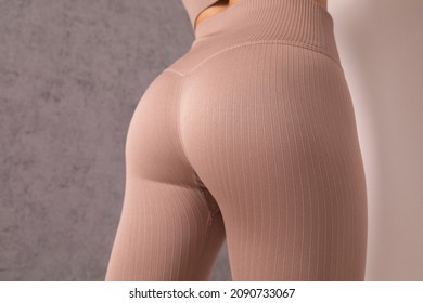 Close up of buttocks fitness woman in sportswear. Home fitness workout. Female athletic glutes and legs close up. - Shutterstock ID 2090733067