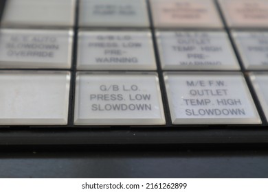 close up button of main engine control panel. a panel located on the ship control bridge of the supply ship to control the performance of the ship's main engine. Vintage photo
