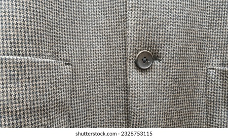 Close up of button on suit