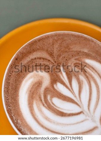 a close up of caffe latte