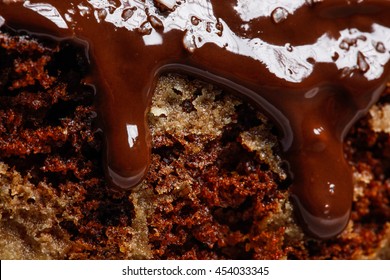 Close Up Of Cake With Flowing Chocolate