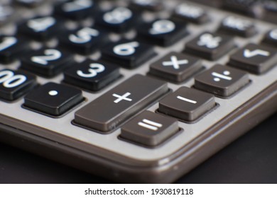 Close Up Calculator On Table And Business Concept