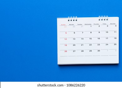 Close Up Of Calendar On Blue Background Planning For Business Meeting Or Travel Planning Concept