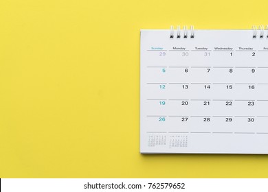 Close Up Of Calendar On Yellow Background, Planning For Business Meeting Or Travel Planning Concept