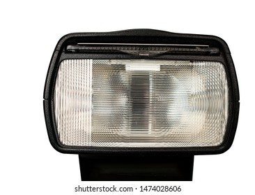 Close up of a camera flash or speedlight head for dslr or mirrorless photographic equipment isolated on white background.