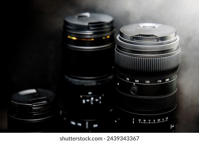 close up of a camera lens on a black background with shallow depth of field - Powered by Shutterstock