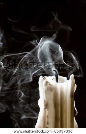 Close up candle with smoke