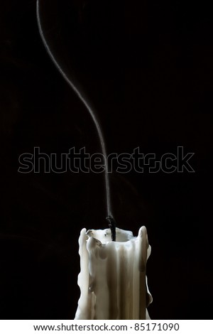 Close up candle with trail smoke