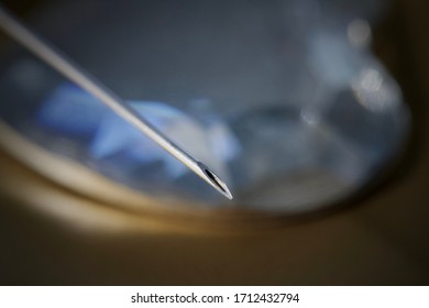 Close Up Capture Of Needle And Syringe