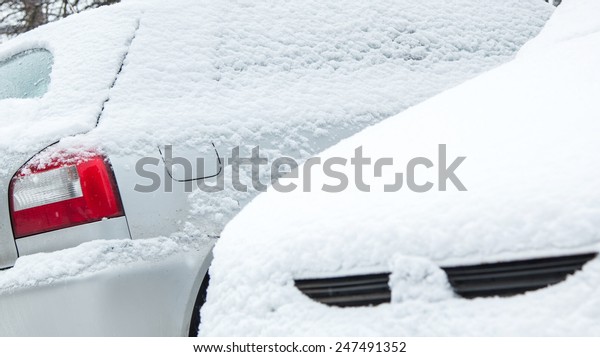 Close up of car covered with\
snow