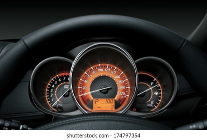 Close Up Of Car Dashboard And Odometer.