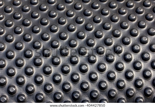 Close up of Car mat - Black carpet,  synthetic
fabrics Rugs background