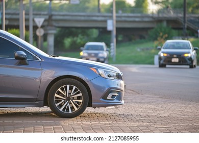 Close Up Of A Car Parked On City Street Side