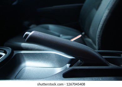 Close Up Of Car Parking Brake, Car Hand Brake On Low Light 