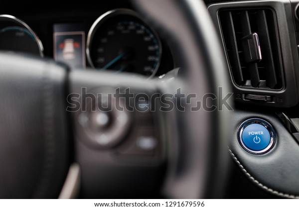 Close up of car stop start system\
with copyspace. luxury prestige car interior,\
dashboard.