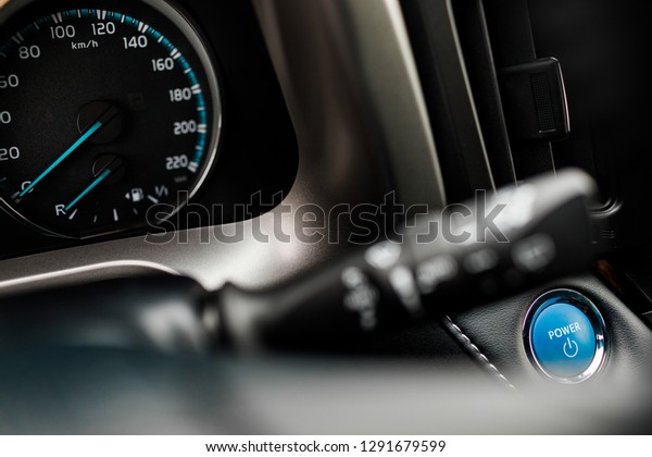 Close up of car stop start system\
with copyspace. luxury prestige car interior,\
dashboard.