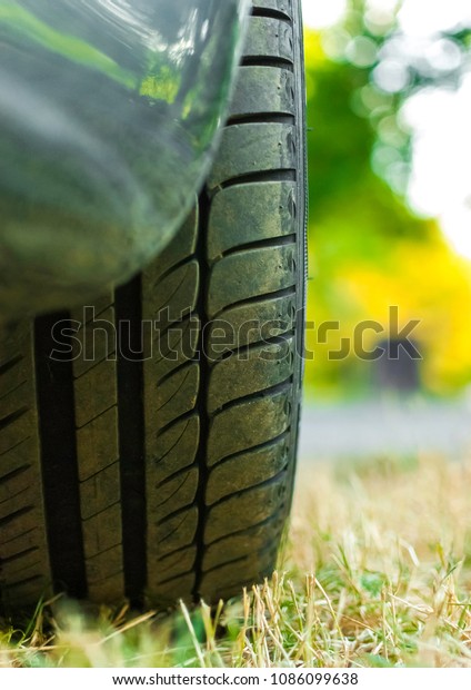 Close up of car tyre or tire tread layer\
pattern. Safe and good tread for\
driving.