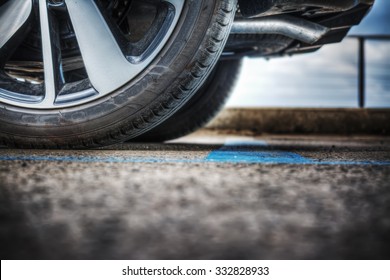 Close Up Of A Car Wheel On The Ground