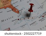 close up of the Caribbean area with Cuba in sharp focus. Cuba on a map. Cuba on a map with red pushpin
