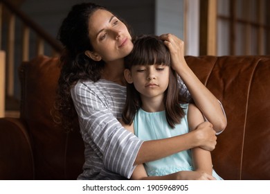 Close Up Caring Mother Hugging, Calming Upset Little Daughter, Sitting On Couch At Home, Mum Comforting Offended Sad Preschool Girl, Expressing Love And Support, Child Psychologist Concept