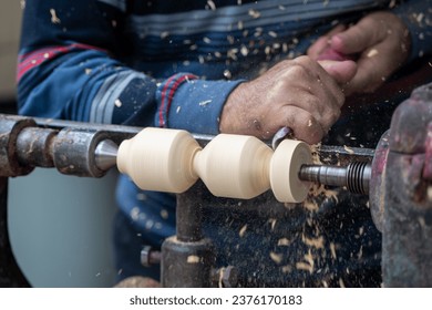 Close up of carpenter working in workshop.