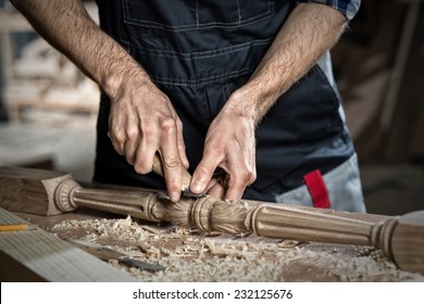 Close Up Carpenter's Hands That Work With Cutter