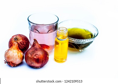 Close Up Of Caster Oil,onion Juice Mixture Used To Make Hair Stronger And Thicker Isolated On White.;