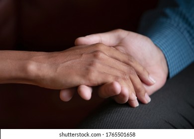 Close Up Caucasian Man Holding Palm Of African Ethnicity Beloved Woman, Symbol Of Love, Beg Apology Forgiveness, Interracial Family, Romantic Relations, Bond. Asking Hand And Heart, Marry Me Concept