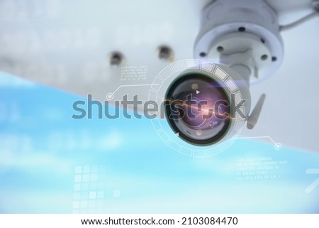 Close up of CCTV camera over defocused background.