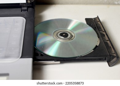 close up of cds and dvds on gray background