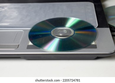 close up of cds and dvds on gray background