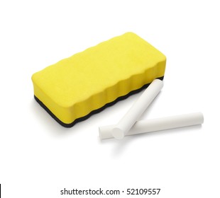 close up of chalks and eraser on white background with clipping path