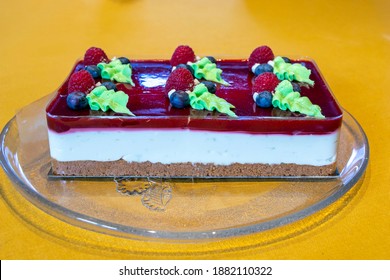 Close Up Of Cheese Cake With Berries, Red And Blue Fruits For Special Occasion Dinner With Friends And Family For Christmas And New Year Party. 