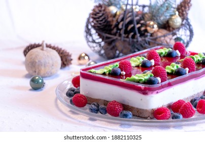 Close Up Of Cheese Cake With Berries, Red And Blue Fruits For Special Occasion Dinner With Friends And Family For Christmas And New Year Party. 