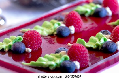 Close Up Of Cheese Cake With Berries, Red And Blue Fruits For Special Occasion Dinner With Friends And Family For Christmas And New Year Party. 