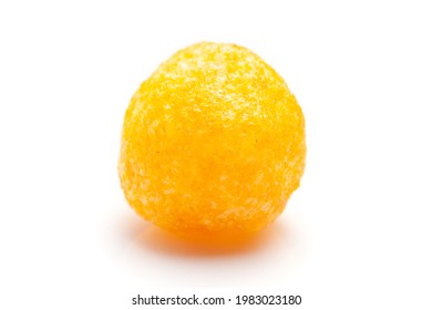 Close up of Cheese Potato Puff Ball Snacks, tangy orange color, Popular Ready to eat crunchy and puffed snacks,  salty  over white background