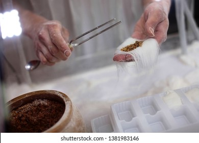 Close up chef making dragon's beard candy at the stall. - Shutterstock ID 1381983146