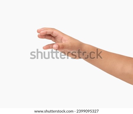 Close up of a child hand with gesture of catching against a white background