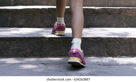 Close Up : Child Walking Up Stair 